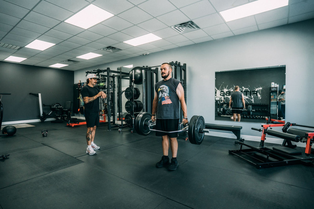 Private personal training floor with squat racks at Fitness Society Coaching, Melbourne FL